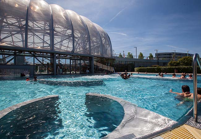 15 Mins from Geneva, 33° All Winter
Vitam Heated Indoor Waterpark 7/7. Choose:


	Kids: Aqua zone for fun & slides
	Adults: ​Wellness zone for relaxation

 Photo