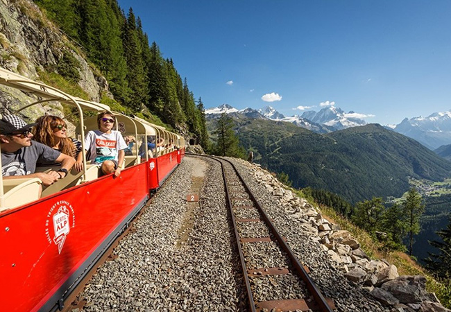 Tripadvisor Cert. of Excellence Switzerland's Best: Mountain Rail-Cars Trip to the Emosson Dam in Valais (Family Friendly) with VerticAlp EmossonRide the world's steepest double-decker funicular 2000 meters up with stunning views of Mont Blanc & the Emosson dam, and stop to trek if you want. 1h35 from Geneva, 1h20 from Lausanne
 Photo