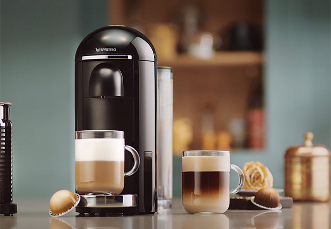 Nespresso VertuoPlus Deluxe Black Coffee Machine, plus:​
+ CHF 100 Capsule Credit
+ Travel Mug
+ Free Shipping Nespresso's Vertuo machine is especially designed for big coffee mugs, creating a perfect crema at the touch of a button. Estimated delivery: July 3rd 2019
 Photo